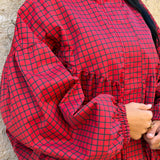 Veste rouge à carreaux